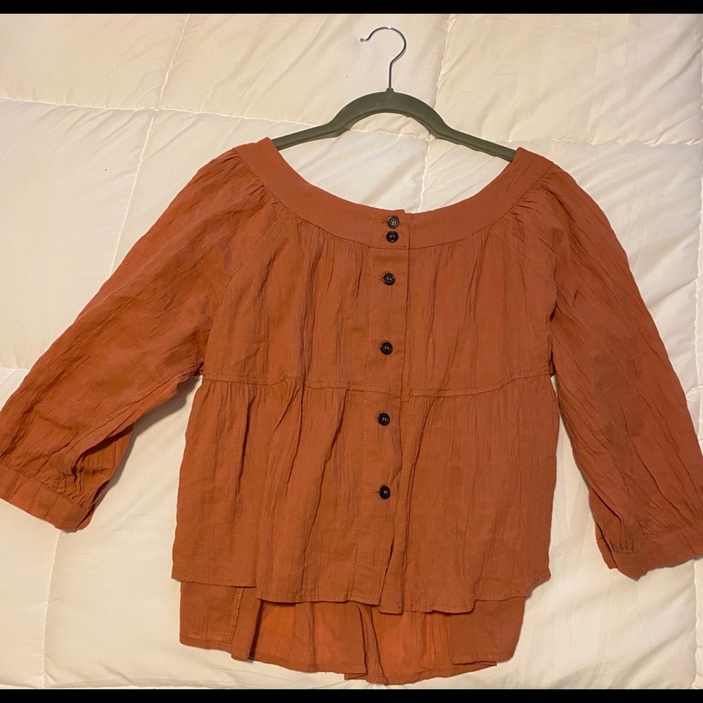 Free People 3-quarter Length blouse.